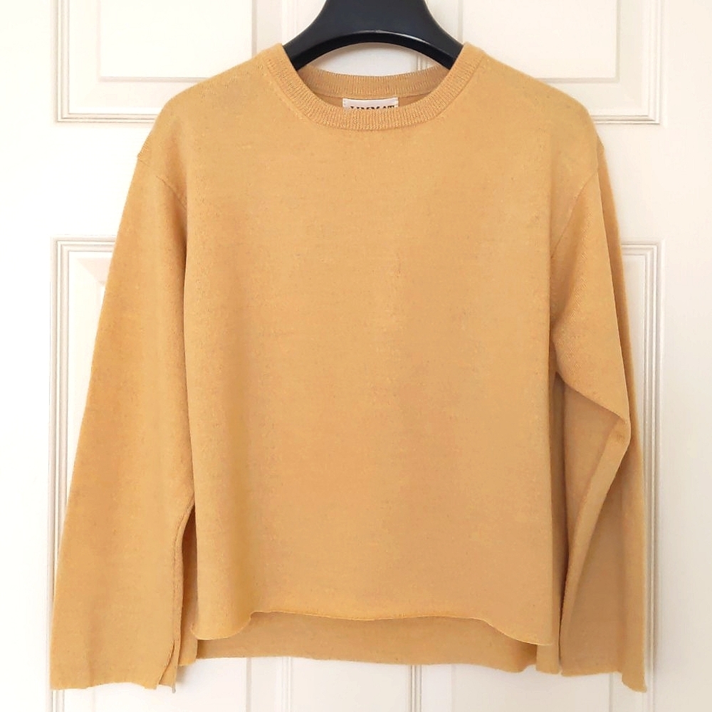 NWOT. Woman's 100% Wool sweater with raw-hem bottom and sleeve.